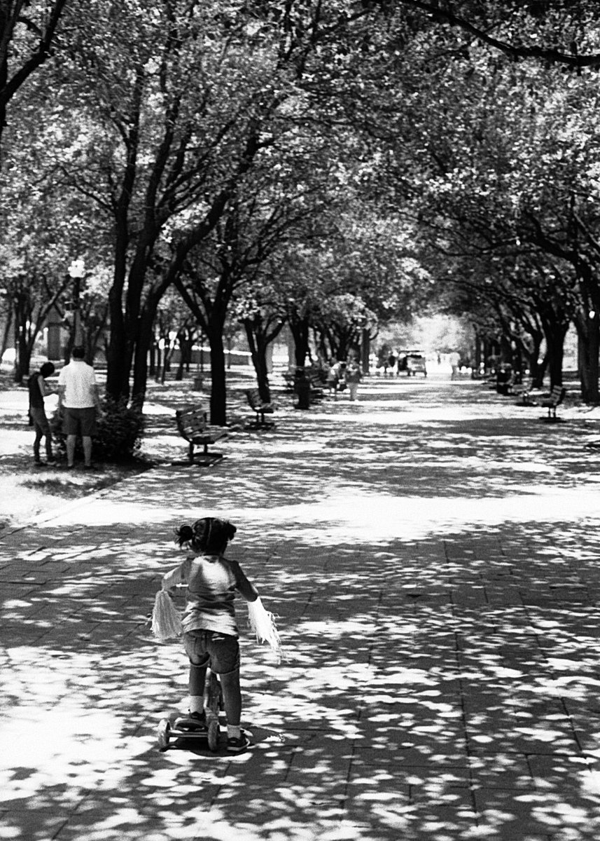 Black and shite film photo of child riding a bike for the first time for #fridayfavourites #pride