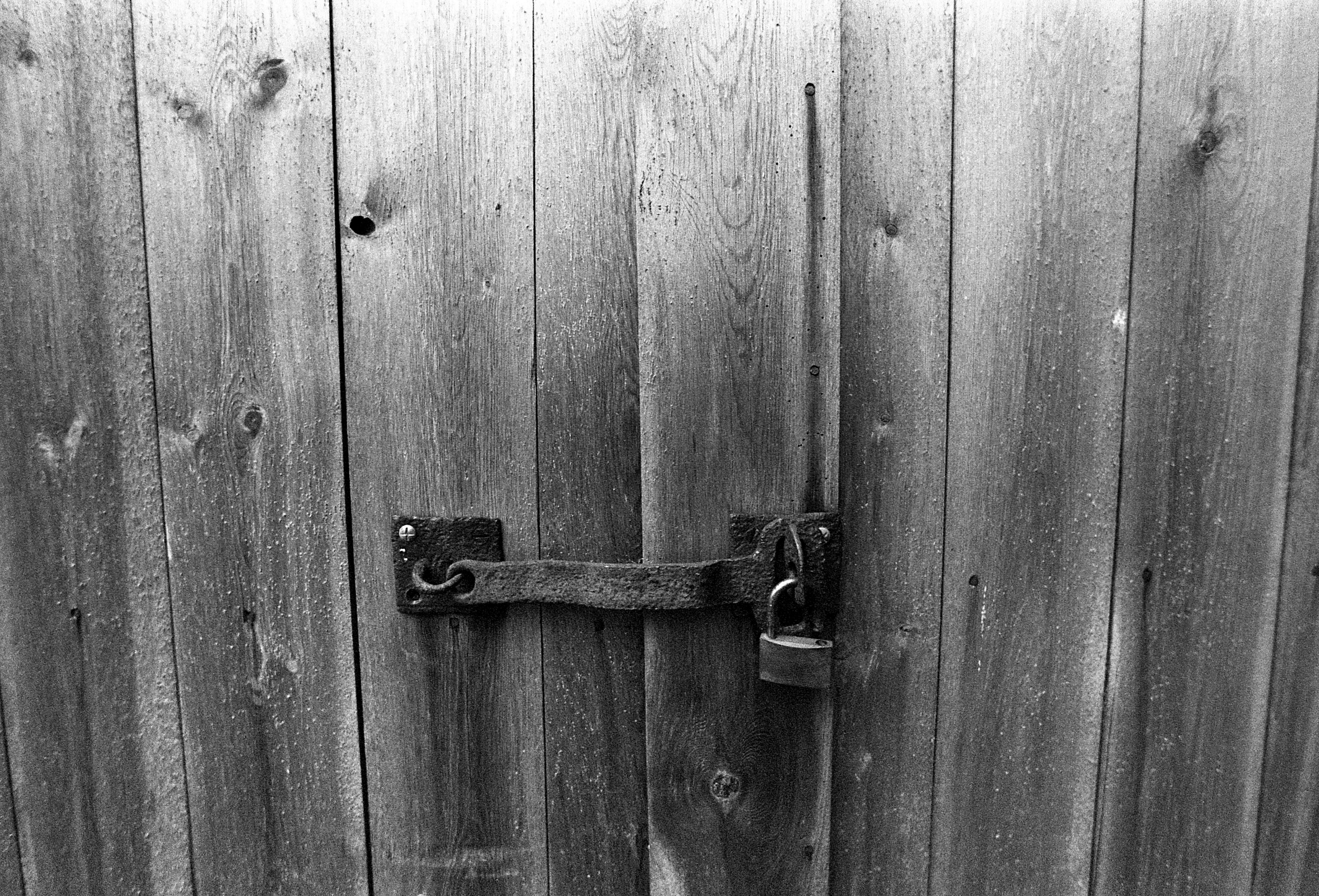 Black and white photo pof interior of old building shot on expired HP5 black and white film by Jason Avery