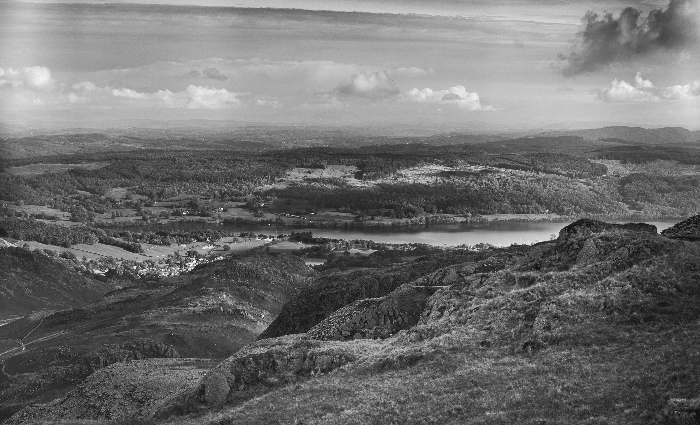 View over Coniston (with unknown light leaks shot on ILFORD FP4+ black and white film by John Whitmore