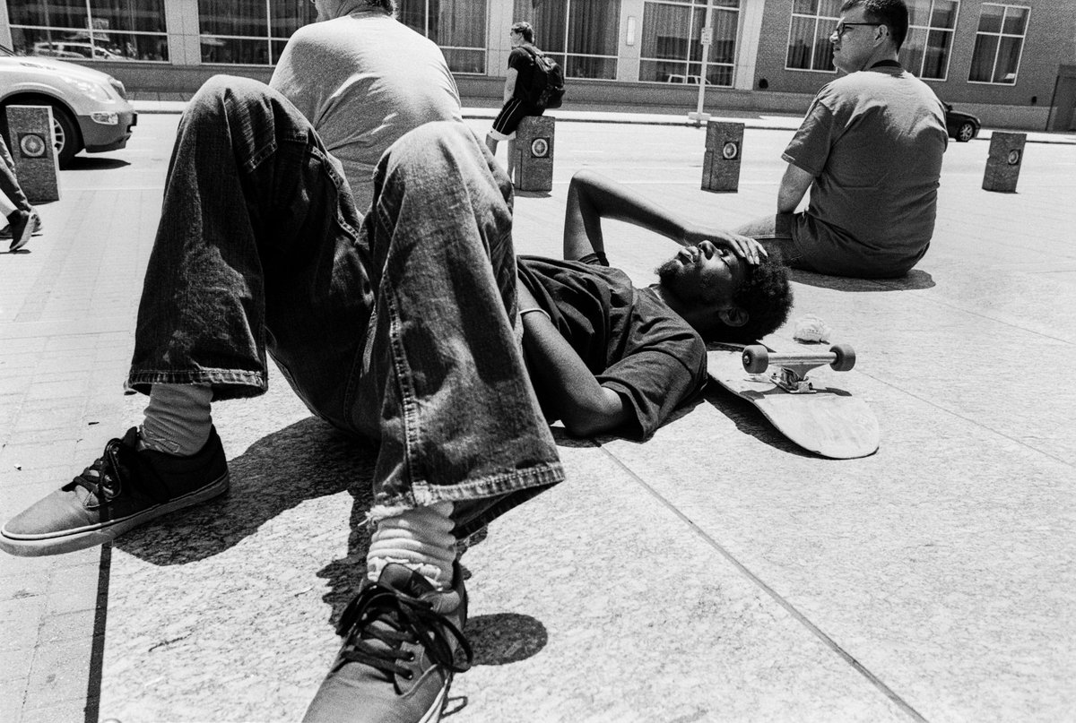 @tmway84 Skateboarder Resting in the Summer Sun Camera: Nikon F5 & 28mm Film: #ilfordphoto #35mm HP5 400iso & #Kodak D76 1+1(11min) Location: #Raleigh, NC USA #believeinfilm #filmphotography #street #fridayfavourites