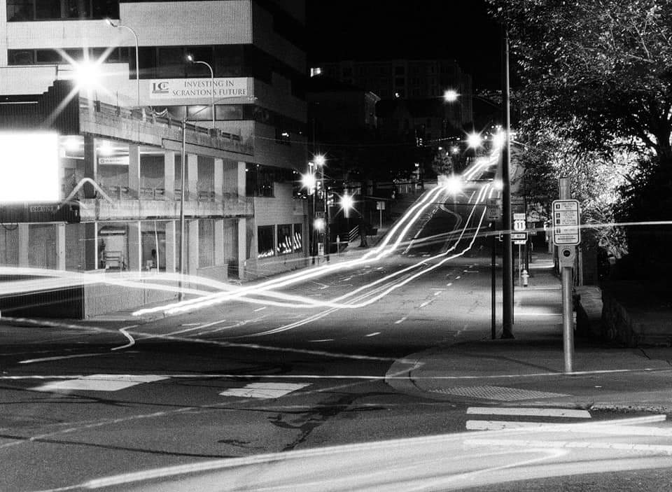 @EYNON33HOUSE · 19h Replying to @ILFORDPhoto #ilforddelta3200 #fridayfavourites The city at night. Scranton, PA. Pentax 645 medium format camera.