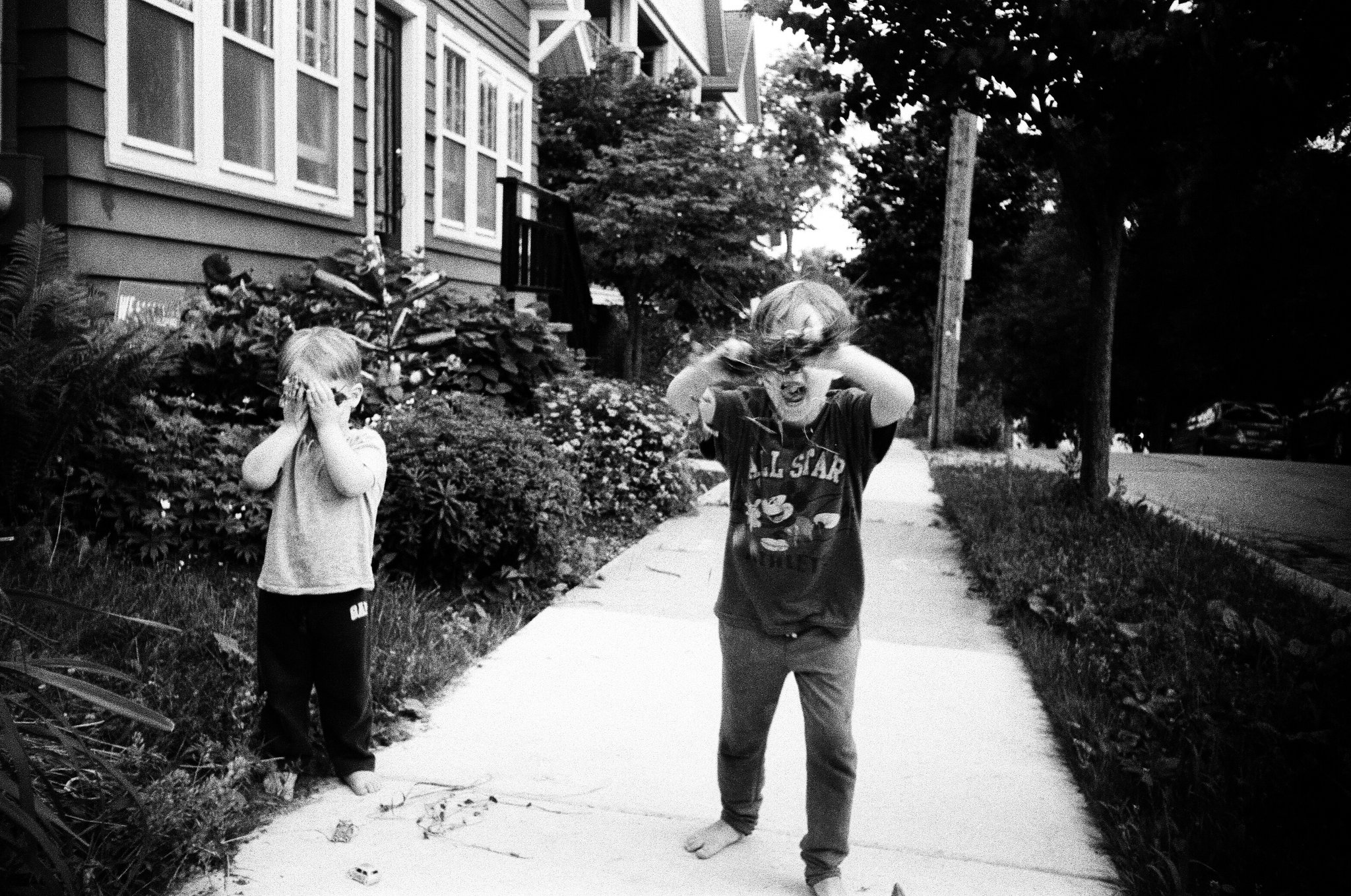 @RevAndyKarlson Playing with grass clippings; kites; afternoon shadows; and flux capacitor anxiety. #plasticcamera #ilfordphoto #fridayfavourites #believeinfilm