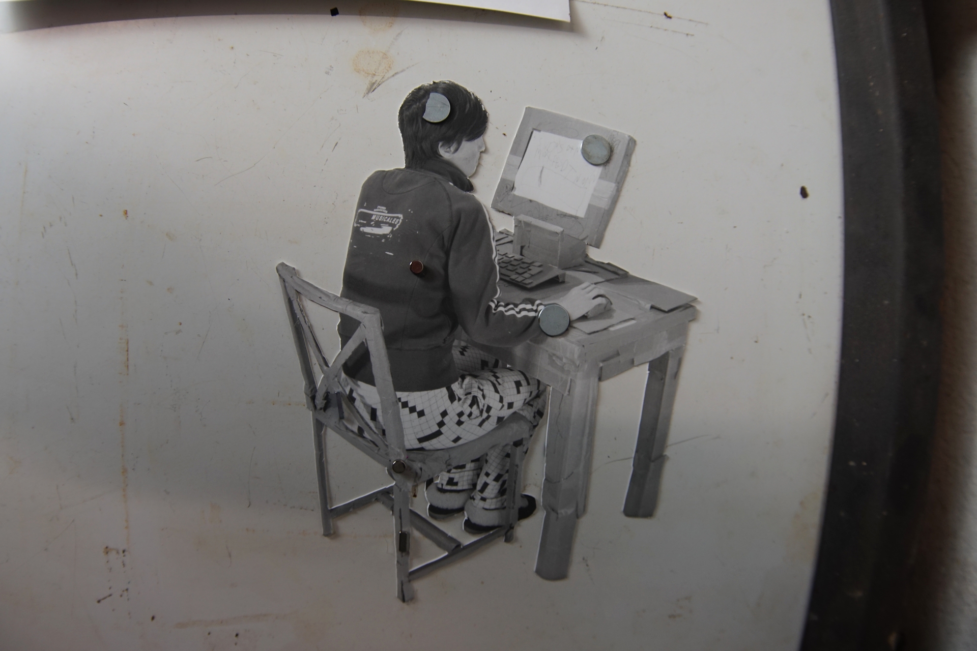 use magnets to hold the masks in place over the paper, the safelight filter on the enlarger to align the next negative with the mask, remove that mask, expose, rinse, repeat, pray.