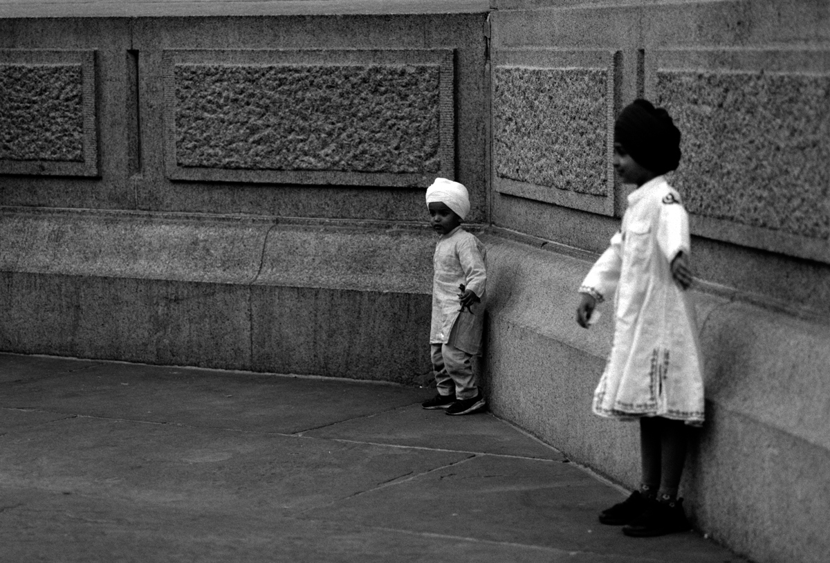 Black and white film image of Sikh remembrance day shot on ILFORD Delta 100 film by Simon King