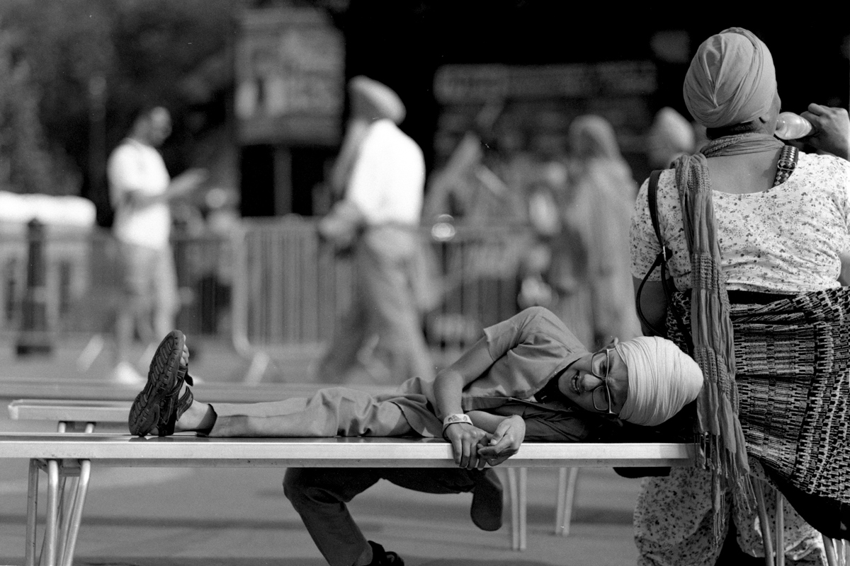 Black and white film image of Sikh remembrance day shot on ILFORD Delta 100 film by Simon King