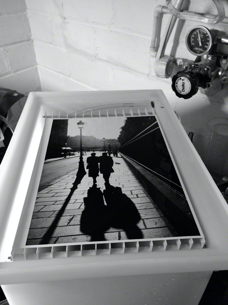 @BlkWhiteFilmPix The tonal range of a traditional silver print made with @ILFORDPhoto Fiber-Based photographic darkroom paper is unmatched. Here, an 11 x 14 FB print of my beloved #Paris in the print washer. #fridayfavourites #fbprint #Ilfordphoto 