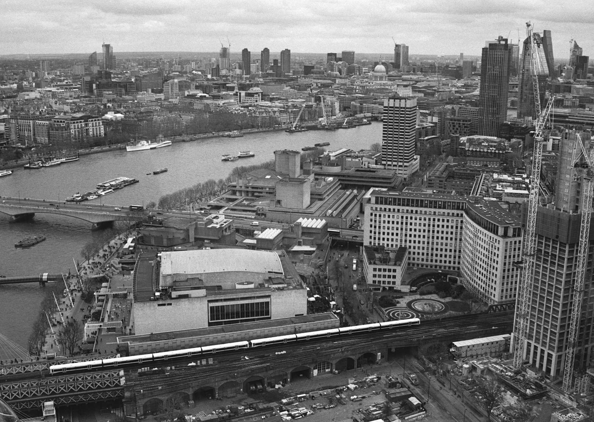  David Henderson @atlantean526 · Dec 2 Replying to @ILFORDPhoto Looking across the South Bank towards the city of London from the London Eye, with the National Theatre in the foreground. London, 18.2.18 Minolta 7000i/ 35-70mm f4 zoom lens @ILFORDPhoto Delta 400/ ID-11. #ilfordphoto #fridayfavourites #sightseeing