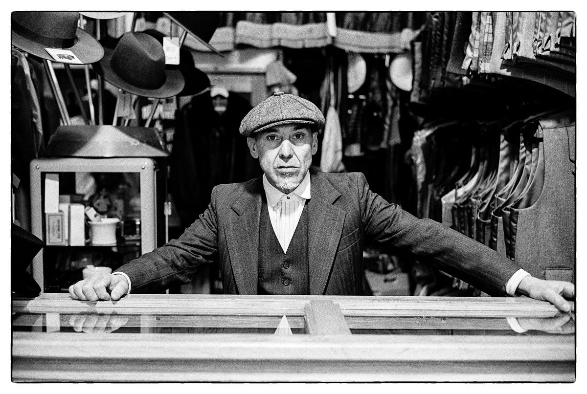 Cardiff-Market Vintage clothes seller in Cardiff, Leica M3. HP5+ at iso 800 © David Collyer