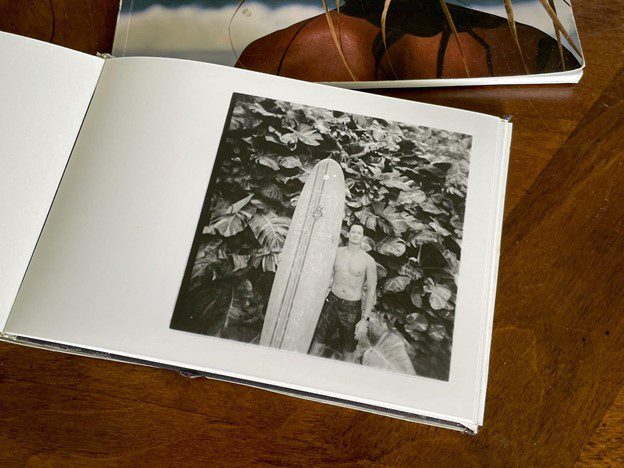 Mike Caputo making a photobook with darkroom prints