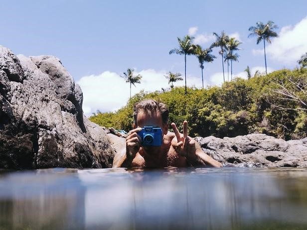 Mike Caputo making a photobook with darkroom prints