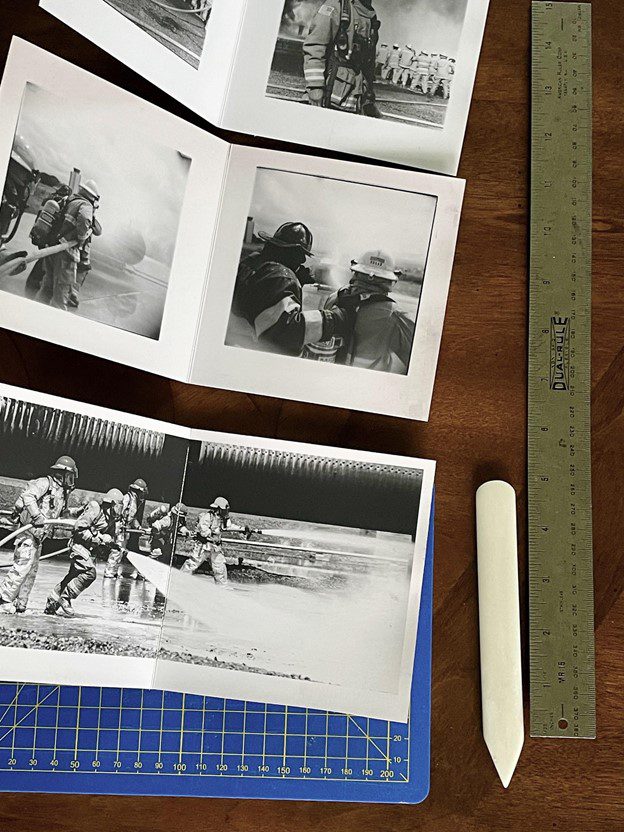 Mike Caputo making a photobook with darkroom prints