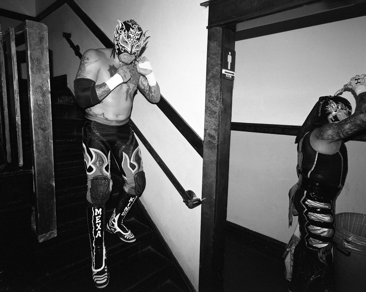 2. Rey Fenix & Pentagon Jr, 2019. Logan Square Auditorium, Chicago, IL. Ilford Hp5 @ 400, Mamiya 7ii/43mm lens w/ flash. Ilfotec HC.