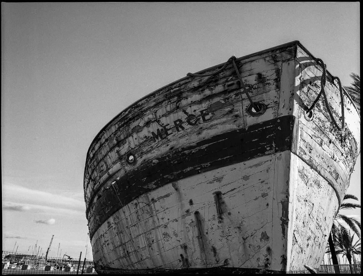 @rrafols · 1h One of my first outings with the #Pentax67 in my hometown. It was an old fishing boat that was later - very unfortunately - dismantled. #ilfordphoto #fridayfavourites #filmmemories #vilanovailageltru Also one of the first films I self-developed at home Smiling face with sunglasses (#HP5 & ilfosol)