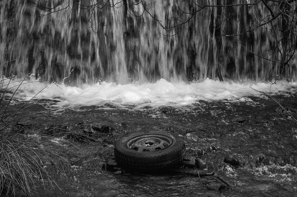 @timdobbsphoto Spare tyre .. Nikon F100, 105mm f2.8 on ilford FP4+ at 200 #ilfordphoto #fridayfavourites #wateronfilm @ILFORDPhoto