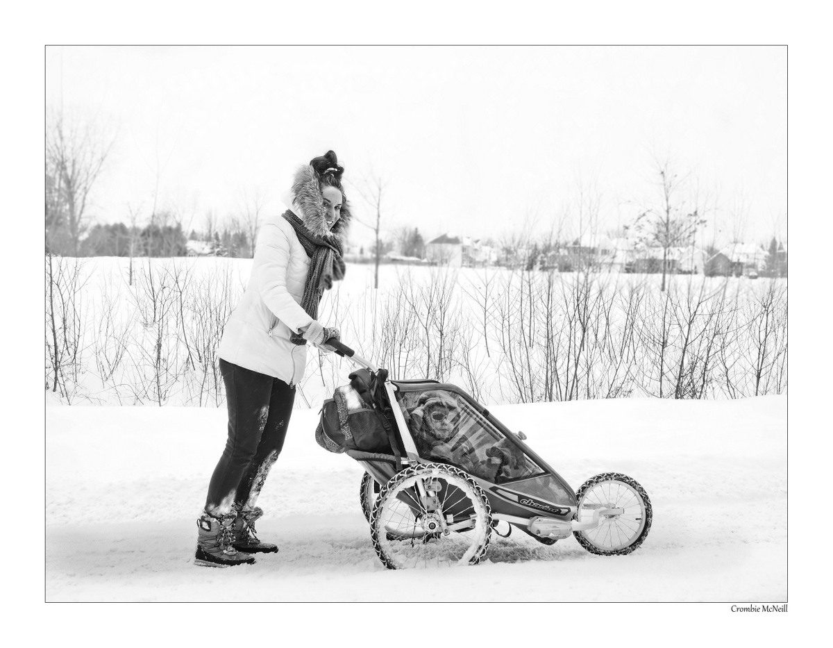 13. Mother with baby's in snow carriage during snow storm. 35 f1.4, 1/250 at f8