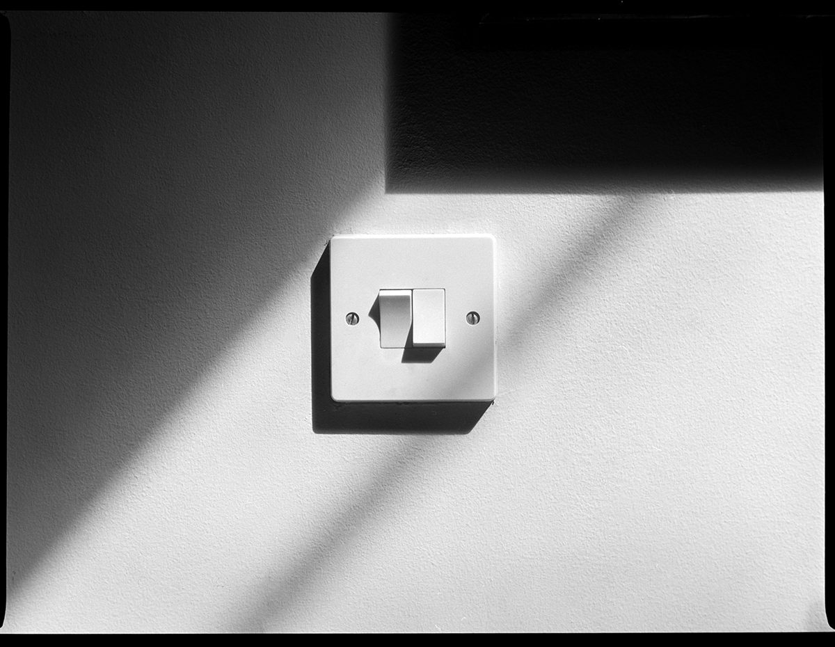 Black and white image of light switch show on ILFORD ORTHO PLUS film by Riger Lowe