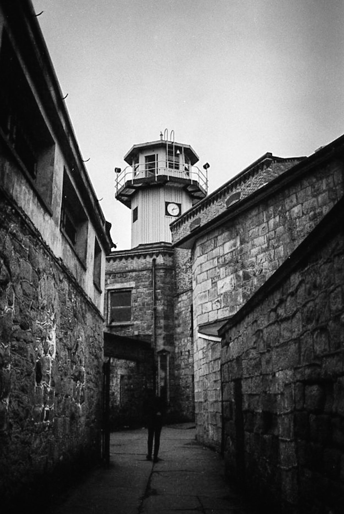 Another opportunity to photograph a shadowy subject near the guard tower. Even if you don't believe in ghosts, a haunting presence is felt everywhere you go here.