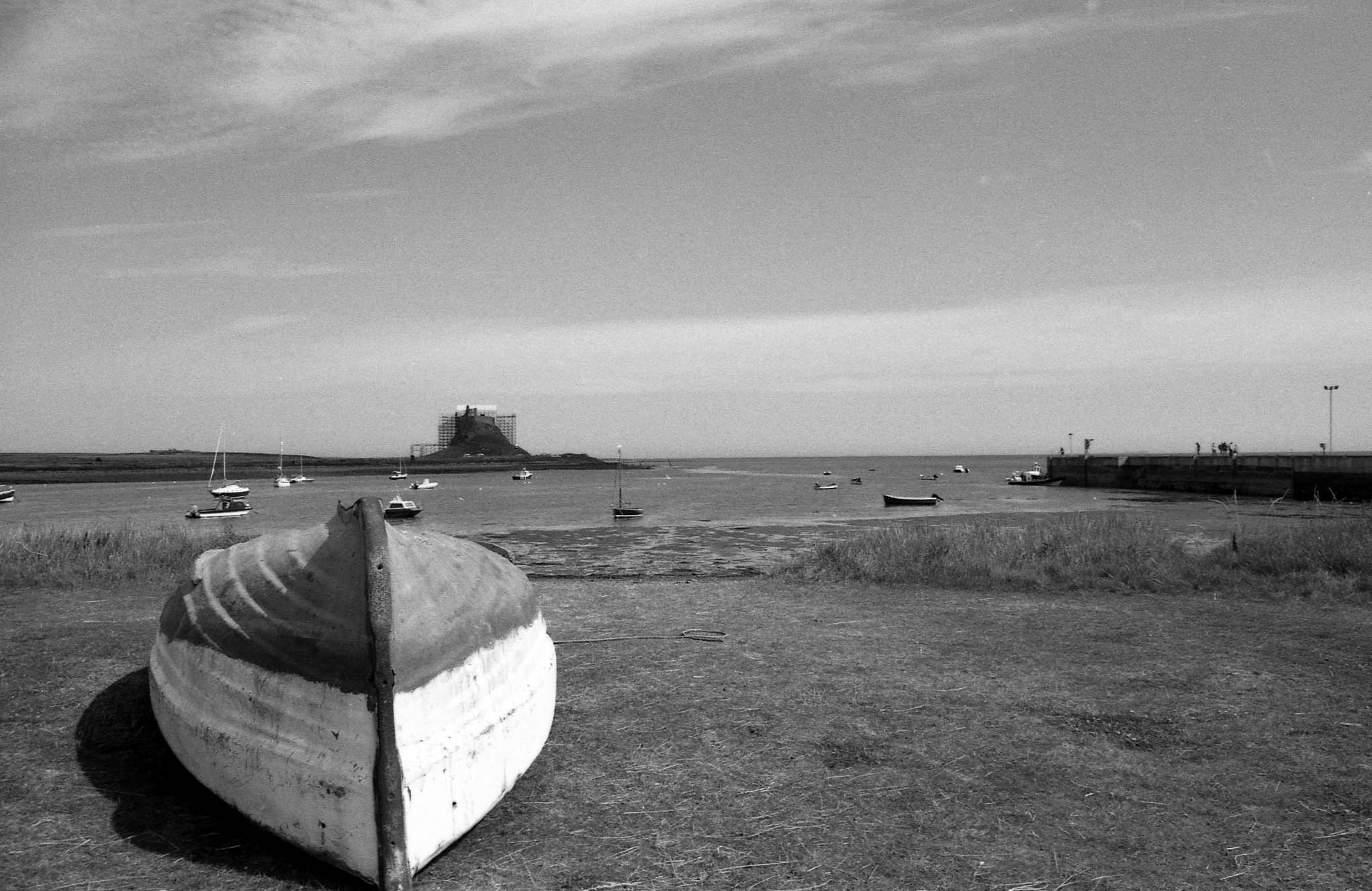 @debrawilsonsays Lindisfarne - Pentax MZ5n on Ilford FP4+ #ilfordphoto #fridayfavourites #boatsonfilm
