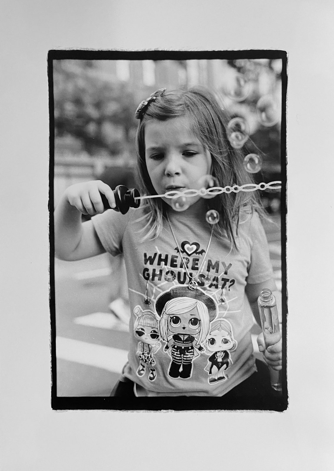 “bubbles”-child-blowing-shot on ILFORD HP5 plus film by Jessica Martineau bubbles