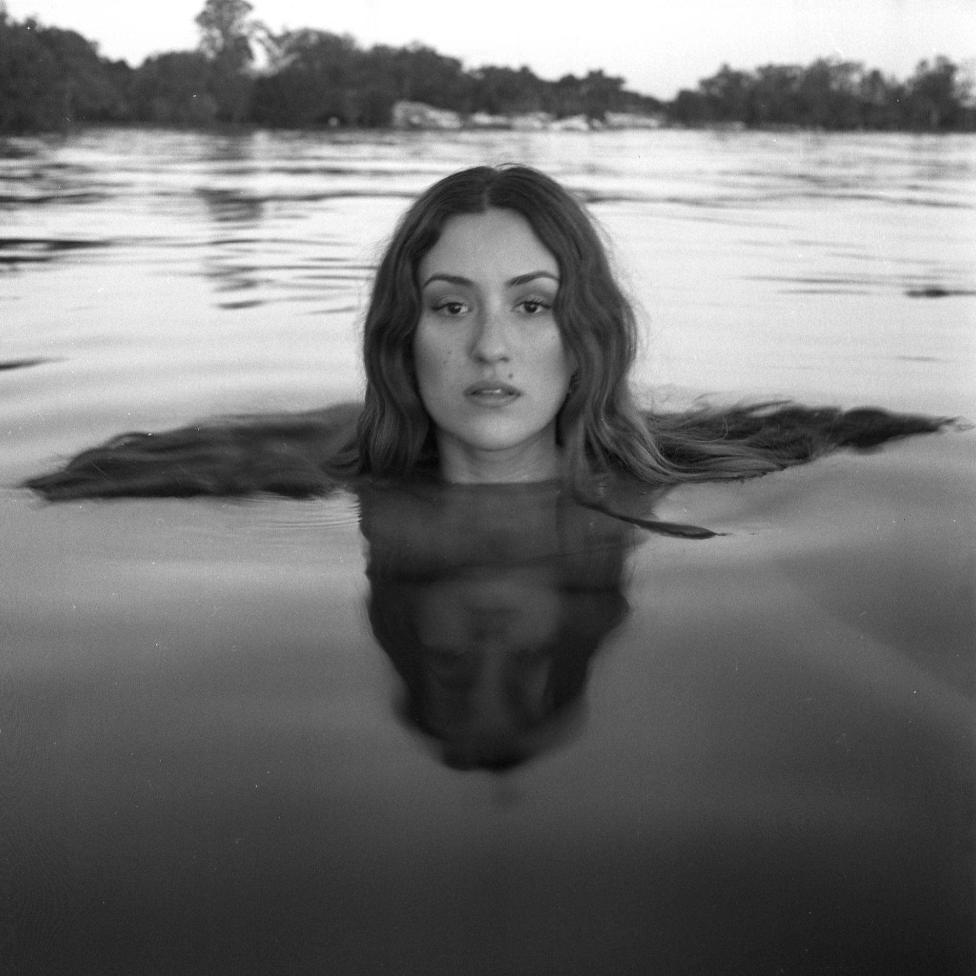 “Water Nymph”, Self Portrait, “Body of Water” series, 2020. Shot on Ilford HP5+ 400, Yashica Mat 124g. Clara Anaujo for In Focus