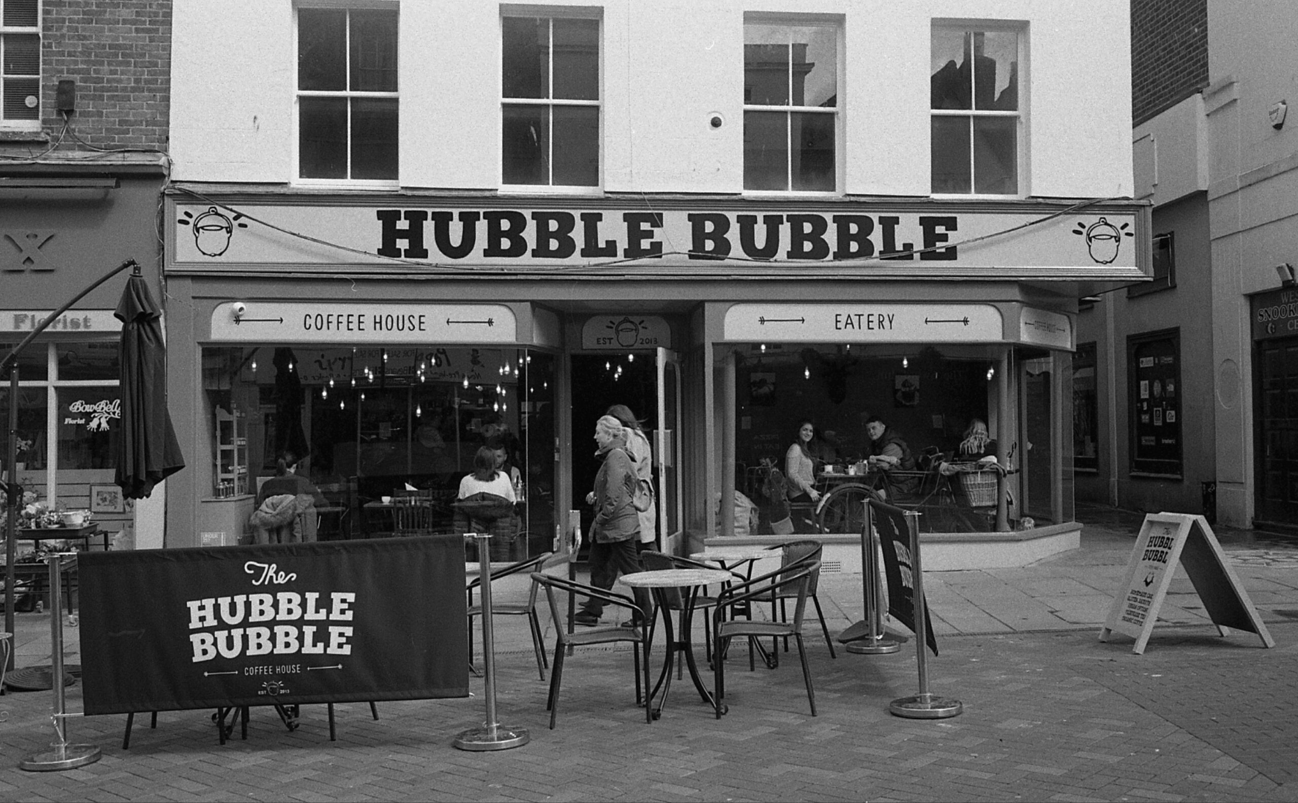 @calor_gas_terry Hope I’m not too late! I took this without raising the couple in the window were starting at me Flushed faceFace with tears of joy Leica M6, Biogon 35/2, HP5 @ 1600 #FridayFavourites #unexpected #ilfordphoto