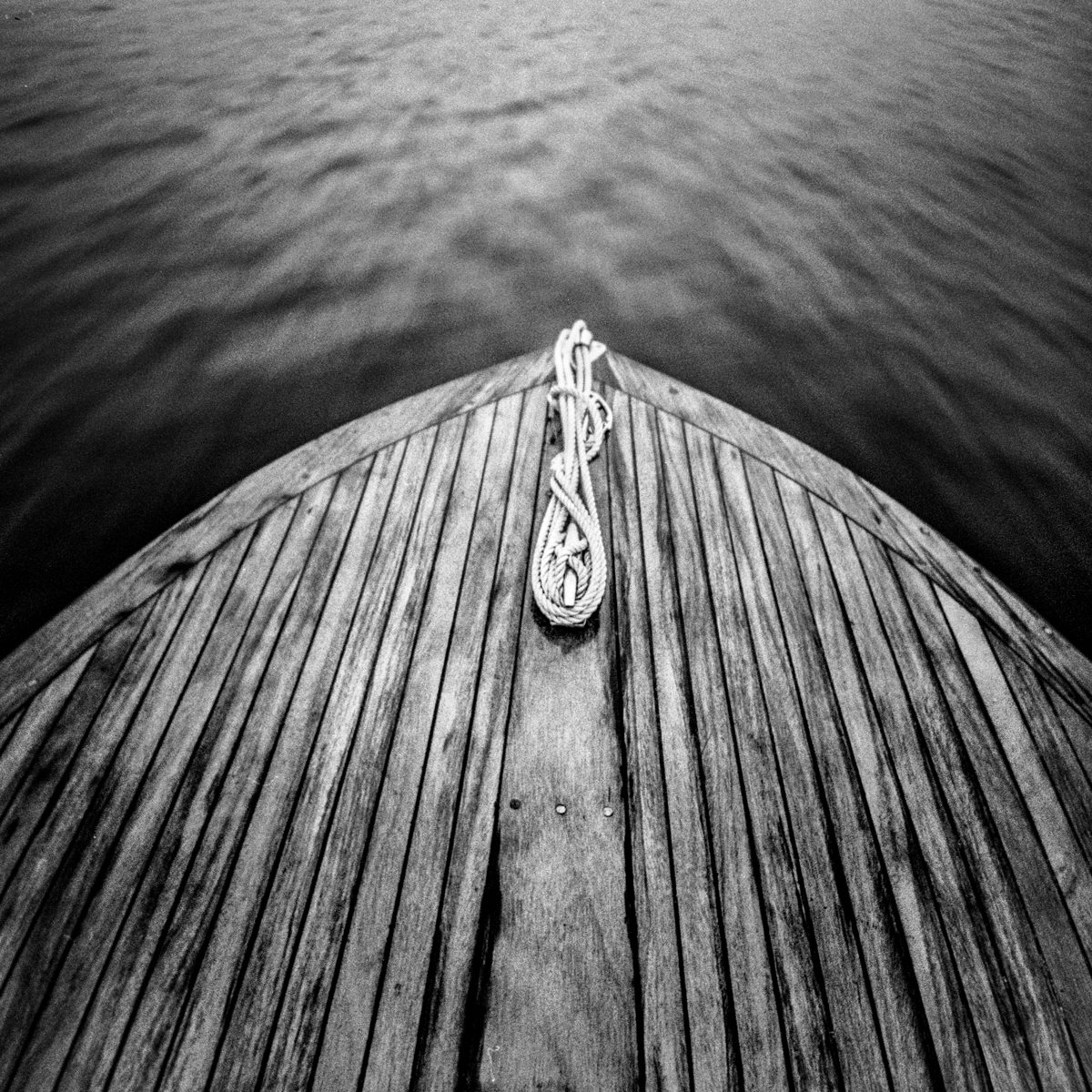 Speed: I'm fascinated by the sense of speed and often try to photograph it. This is a 15 knots view from my old speed boat. Shot with a Lomo LC-A 120 camera on Ilford HP5+ film. Developed in 1+50 Rodinal.