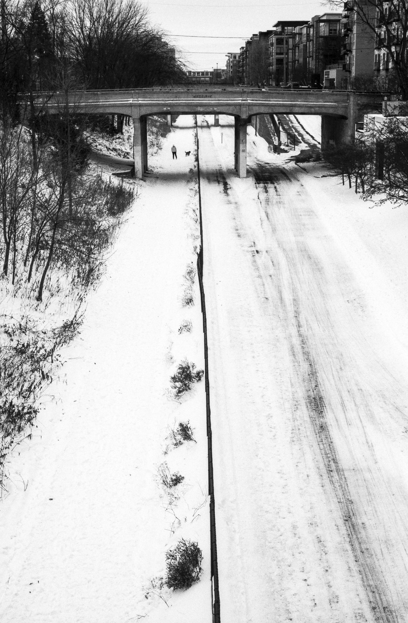 @tomnorthenscold My resolution of choice most often is 35mm. I love the 35mm look from SLRs. This photo is from a walkabout in Uptown Minneapolis. Nikon FM2 w/50mm f/1.4 AI with yellow filter. FP4 rated at ISO 400. HC110b for 18 min at 20c. #fridayfavourites #myresolution #ilfordphoto