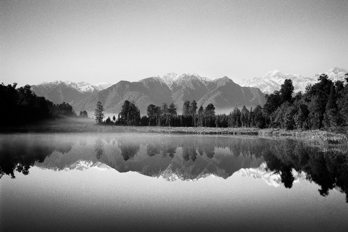 Lake Matheson, New Zealand. Taken on Leica MP with Ilford Delta 100, developed in Rodinal 1+25.