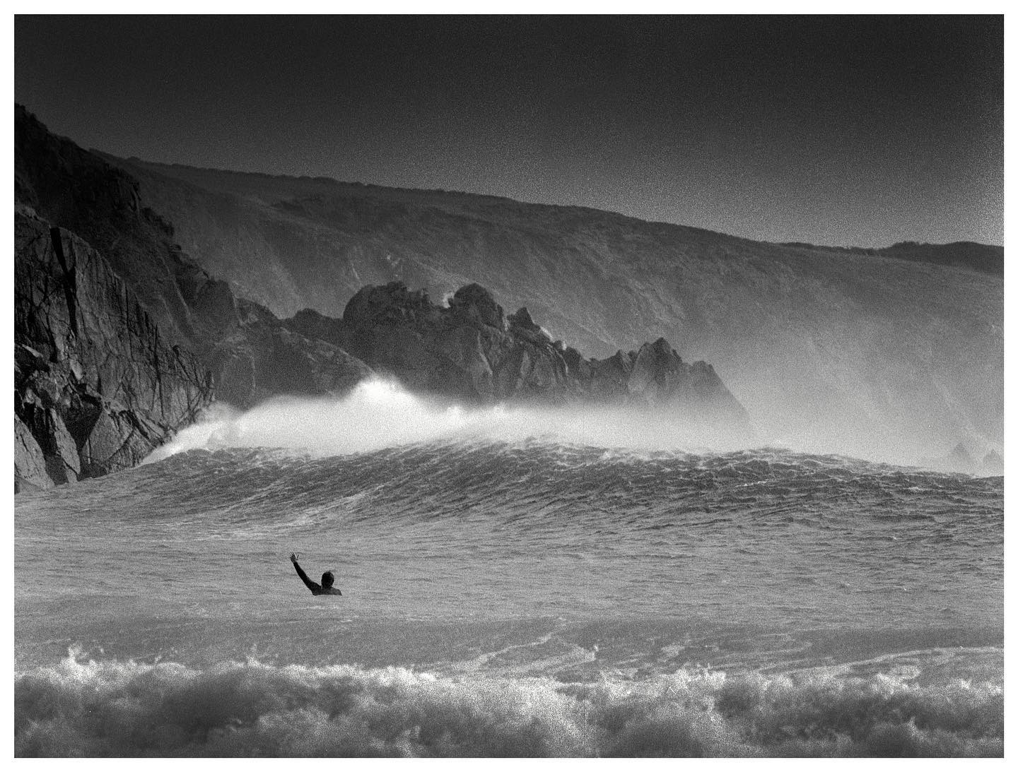 grainy_waves Storm Franklin Only one brave guy out and one idiot shooting medium format on the hasselblad . Not another soul to be seen Hasselblad 500 cm . 500 mm , ilford hp5 pushed to 1600 Developed in DDX 13 mins