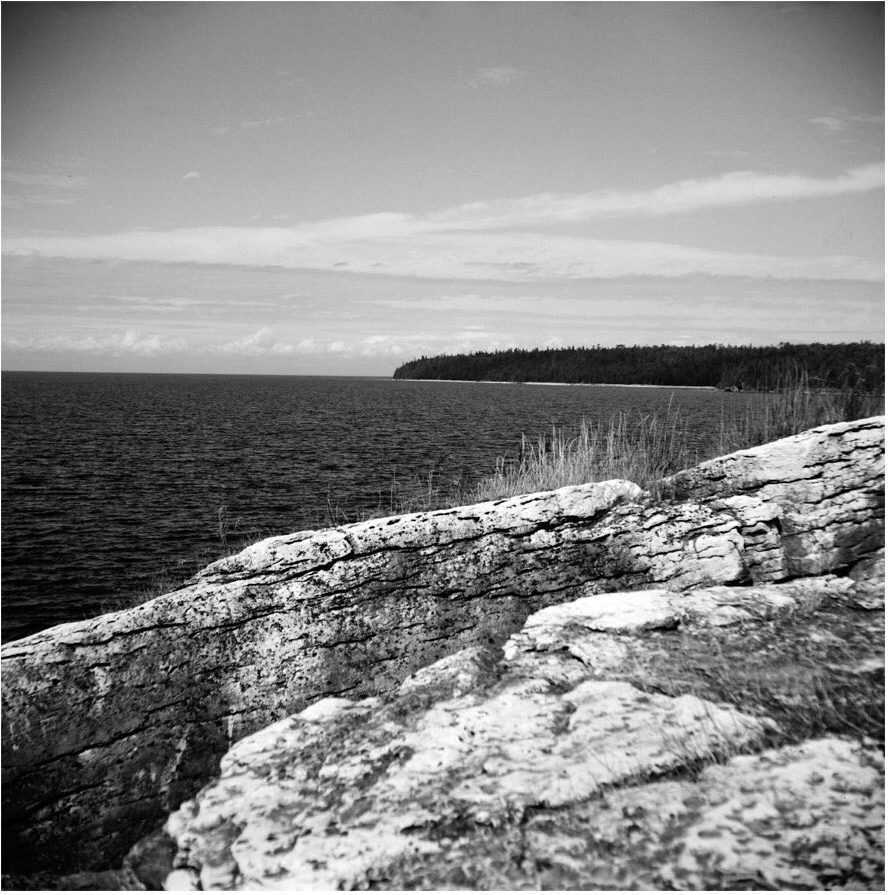 Black and white landscape photography with the view of the sea shot for ILFORD Photo #FridayFavourites #sheshootsilford