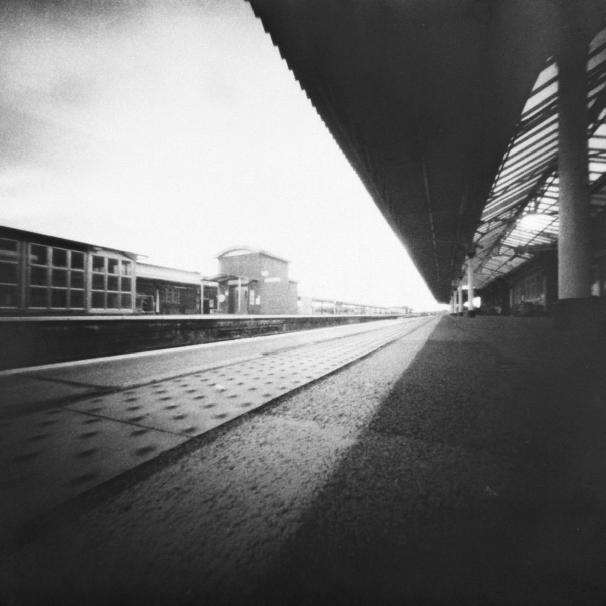 Black and white photo of the train station