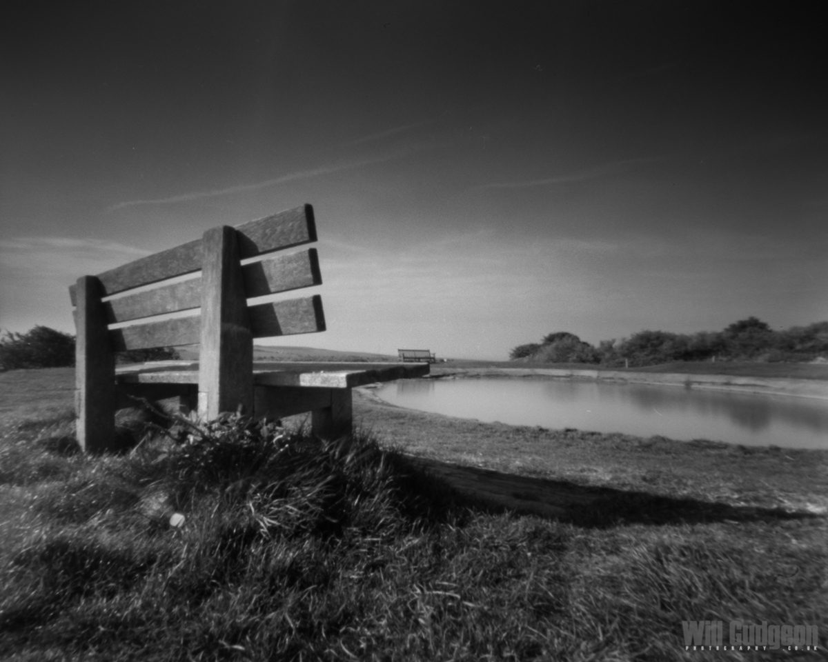 Black and white image of a bench