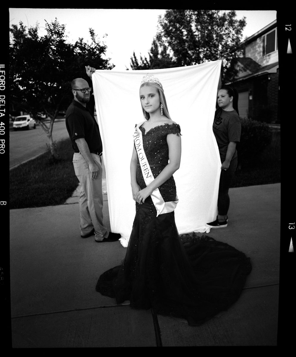 Black and white portrait of a young girl going to prom