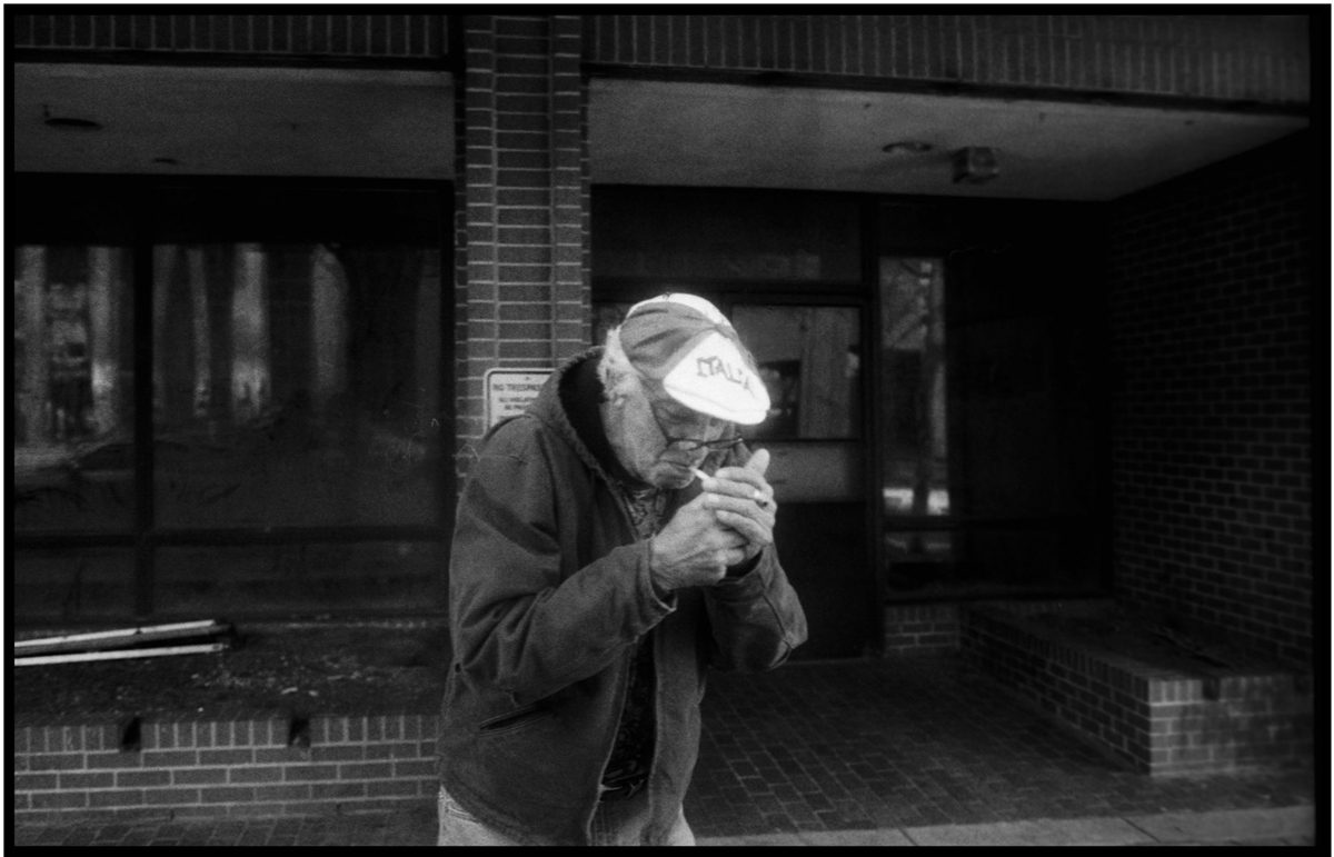 Old man smoking a cigarette