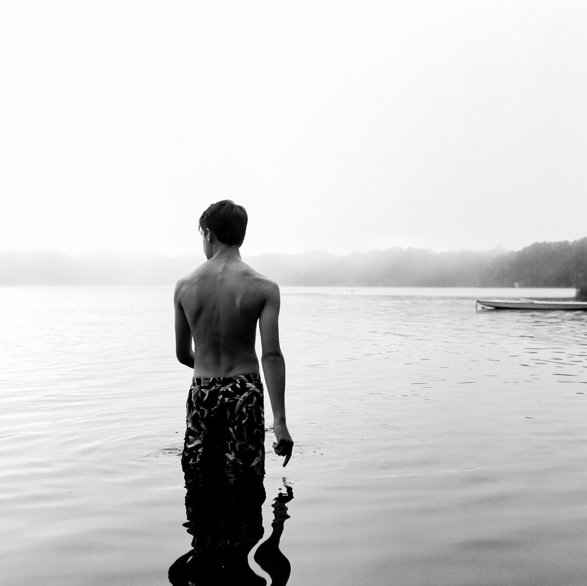 Boy stood in the water