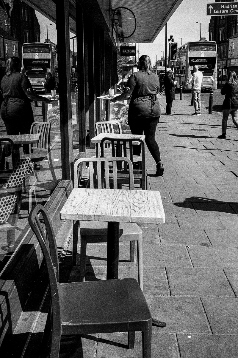 Table and chairs from a cafe on the street