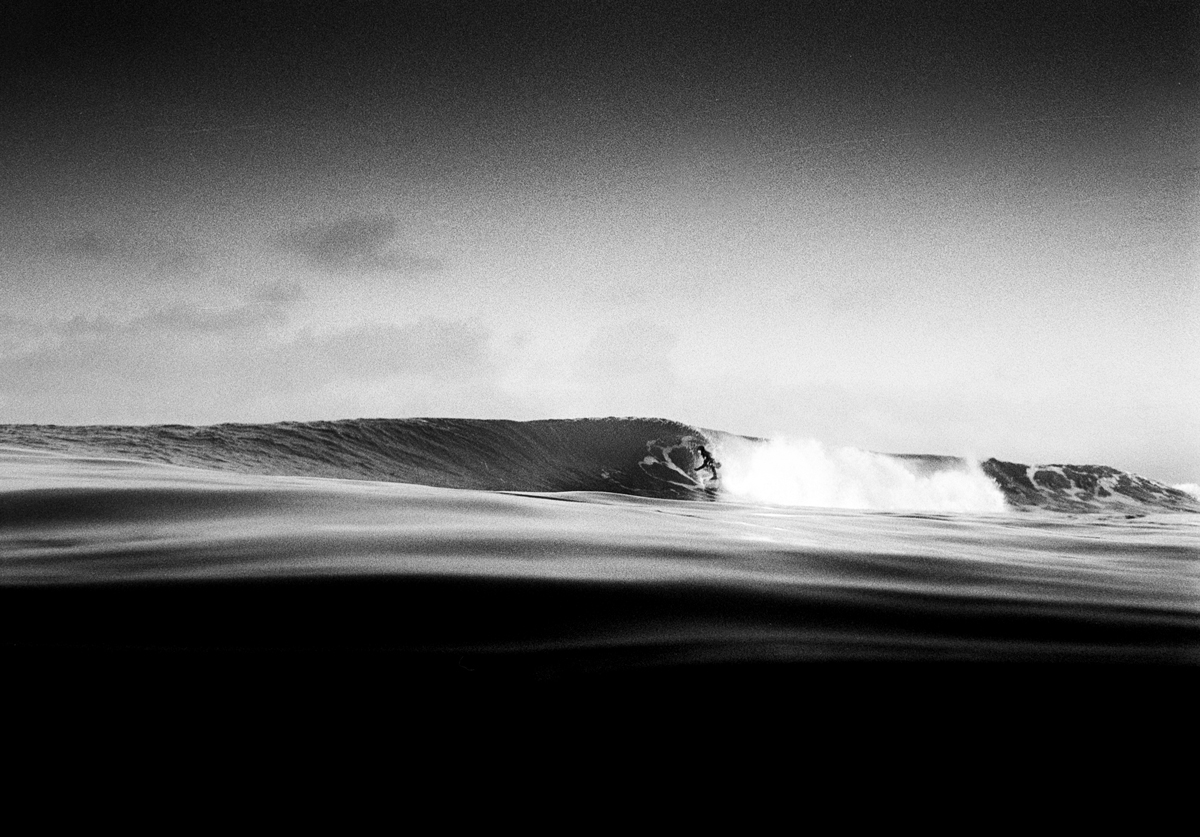 High contrast black and white photograph of the sea