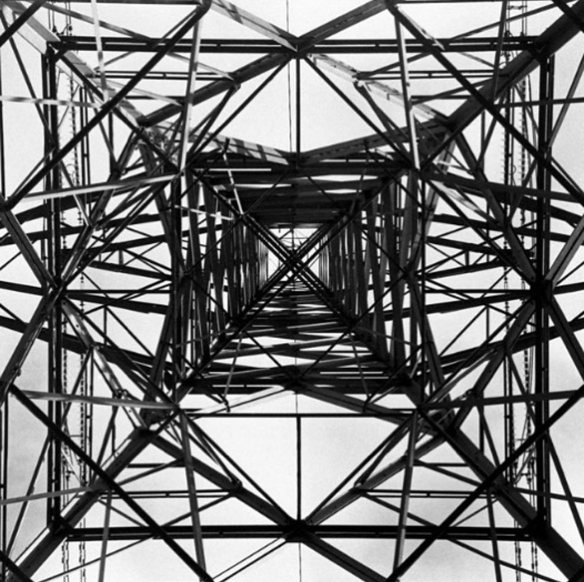Photograph looking up a pylon