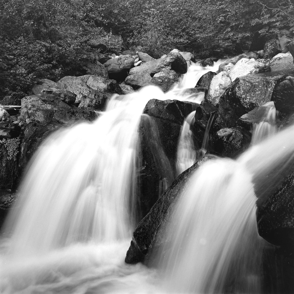 Long exposure black and white photo of a waterfall