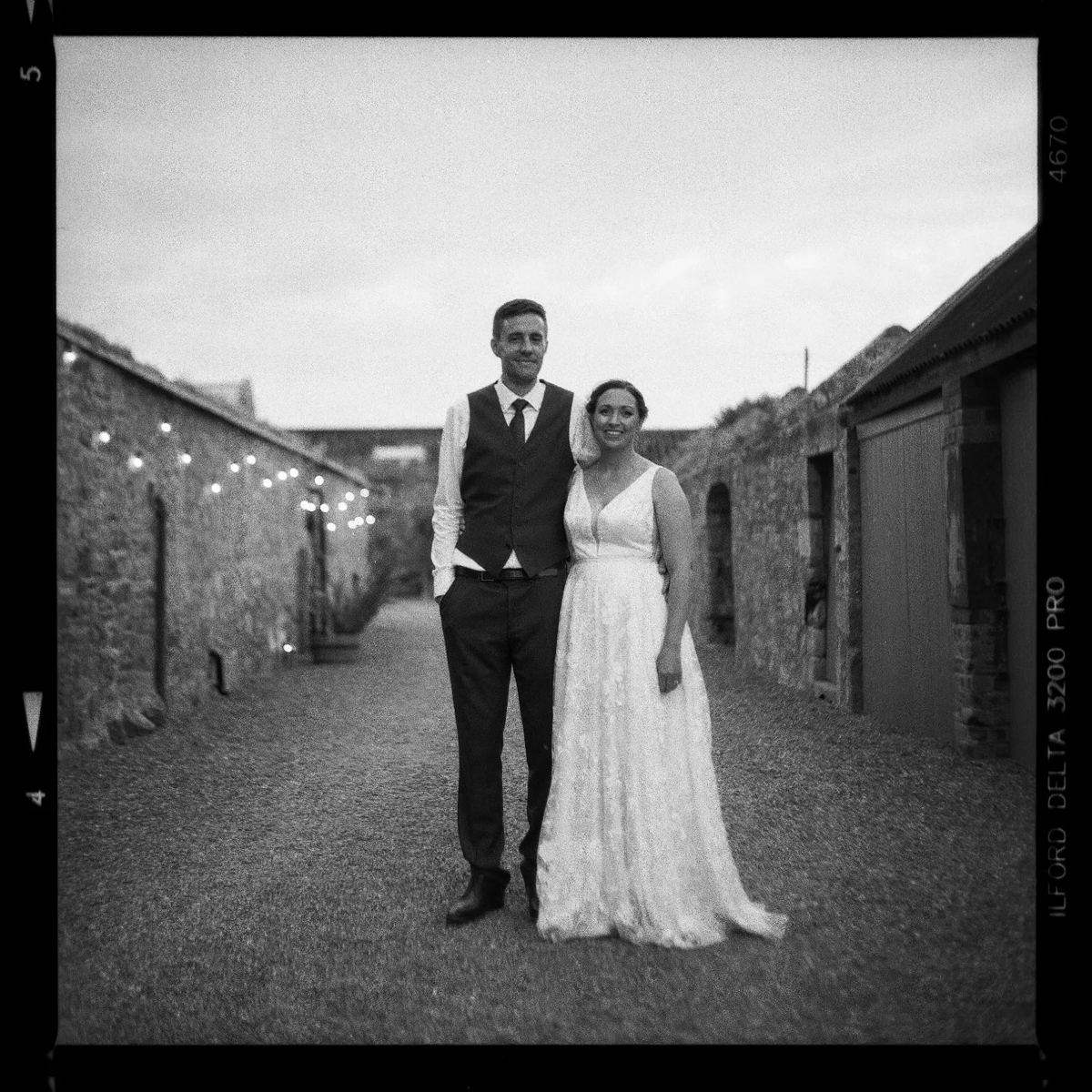 Black and white image of a couple getting married
