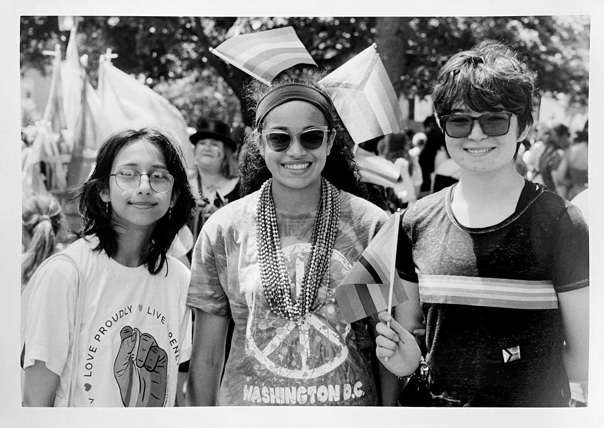 Three women stood smiling for the camera