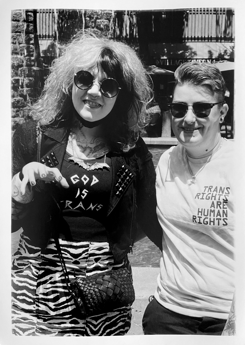 Two women stood smiling for the camera