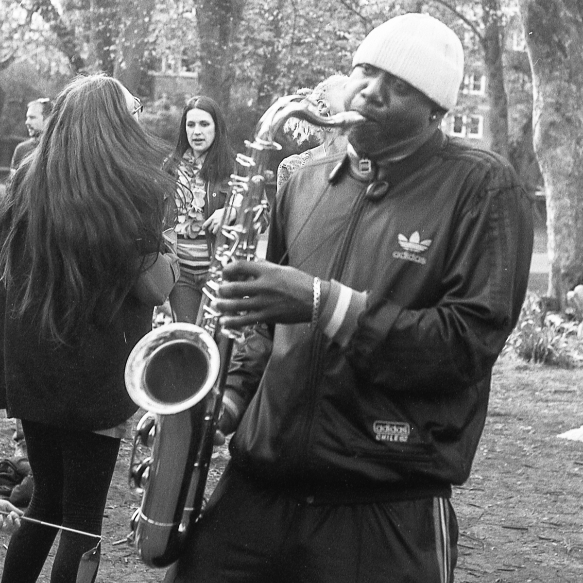 Man of colour playing the saxophone