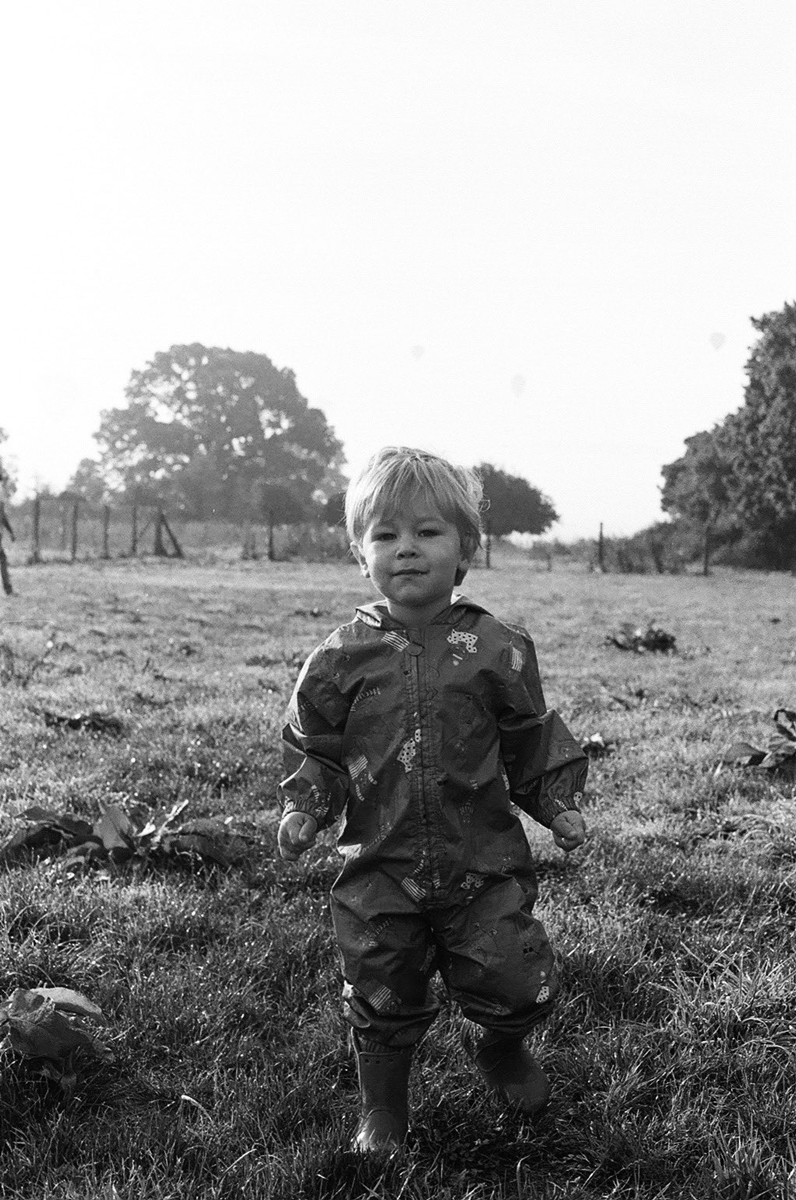 Black and white image of a young boy