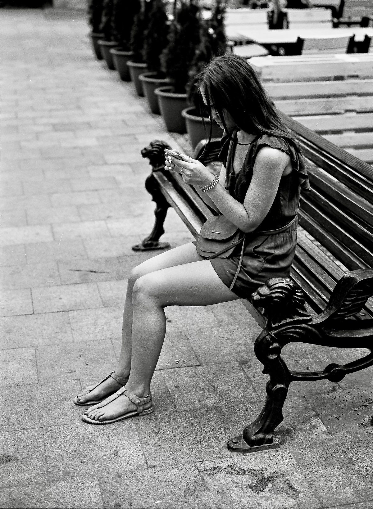 @hejrevell Ukrainian girl in Lviv texting… Film: ILFORD PanF Plus Camera: Leica M7 Lens: Summicron M-50mm 6BIT #Leica @LeicaSociety #believeinfilm #film #AnalogPhotography #ilfordphoto #fridayfavourites #blackandwhite
