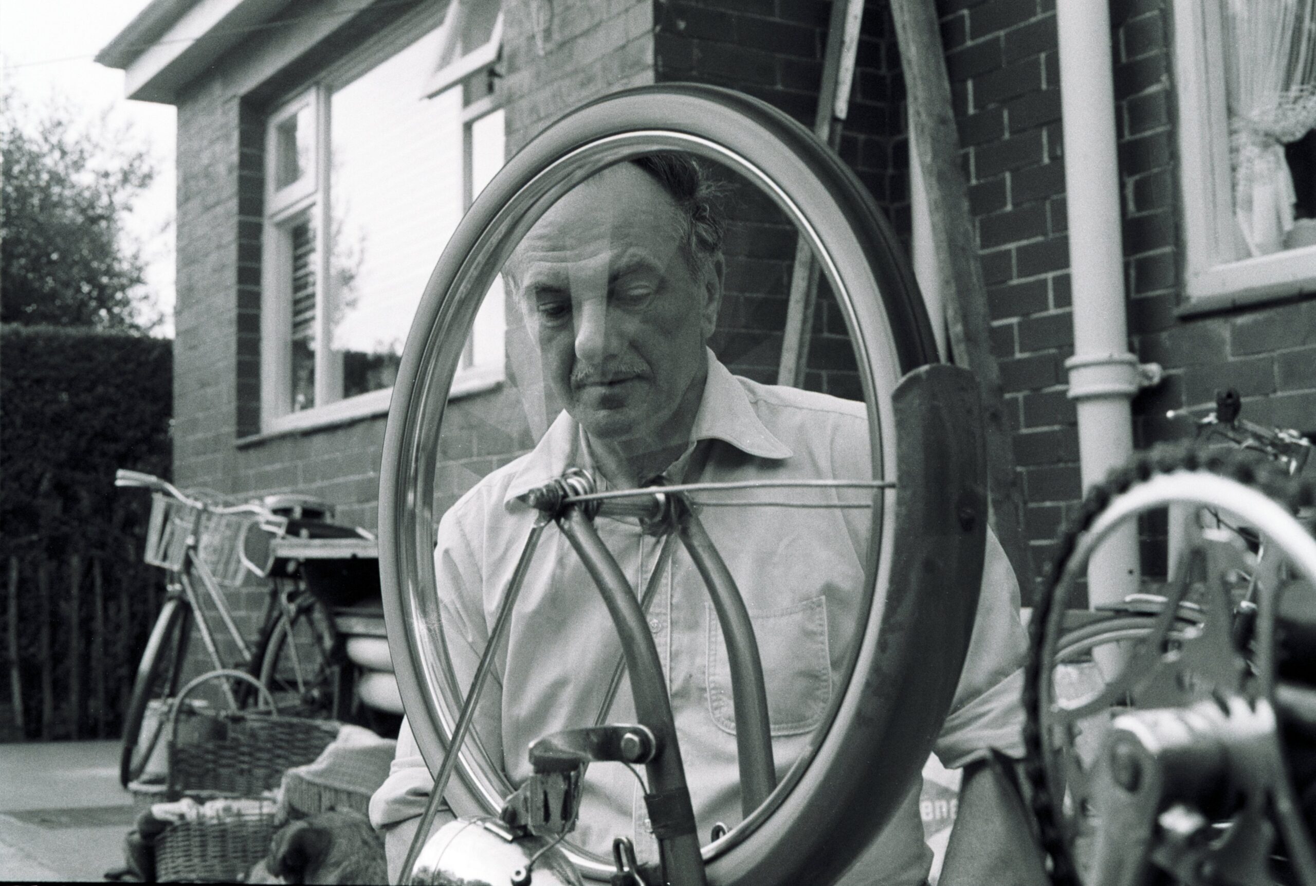 @SomeAreDead #ilfordphoto #fridayfavourites #ilikegrain HP5, 1981 a friends father repairs her bike