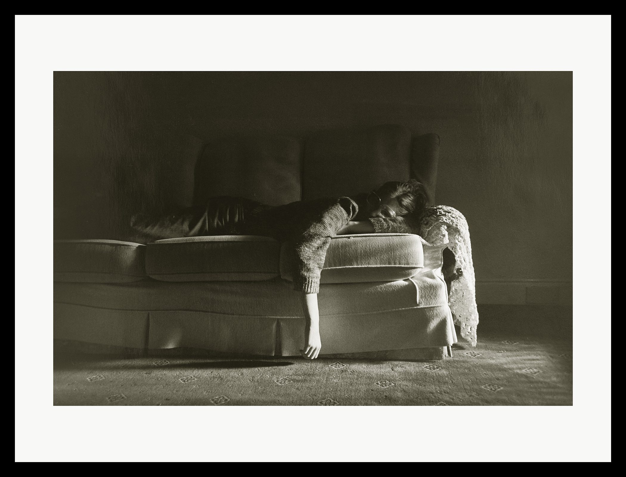 Ilford photo Student competition 2023/24 Runner Up Gracie Healeys Image of somebody on a sofa in a patch of sunlight