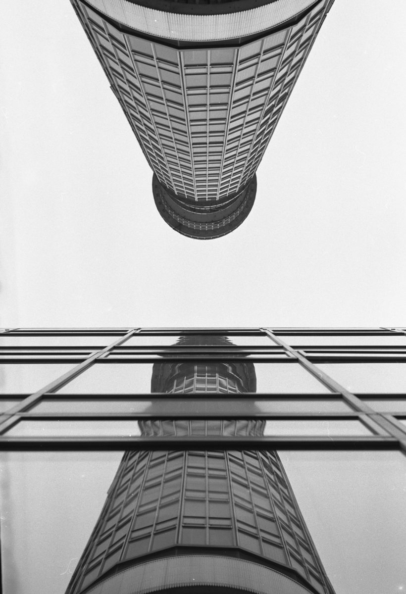 Black and white reflection of a building