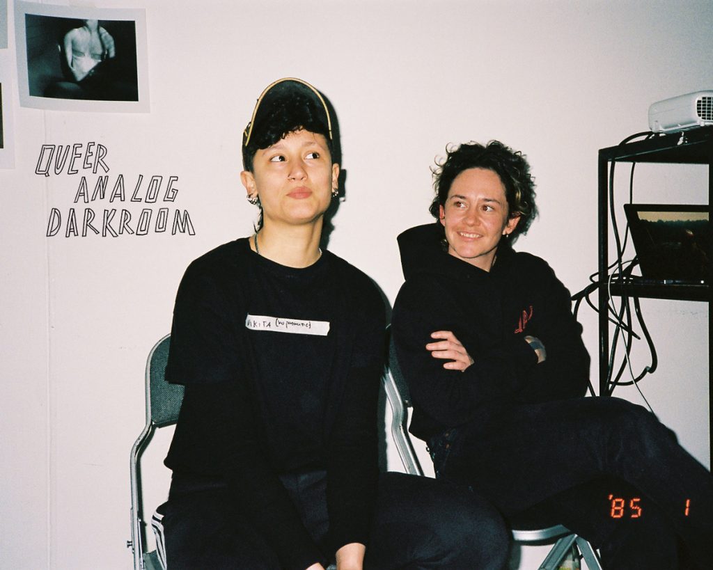 two people posing for the camera