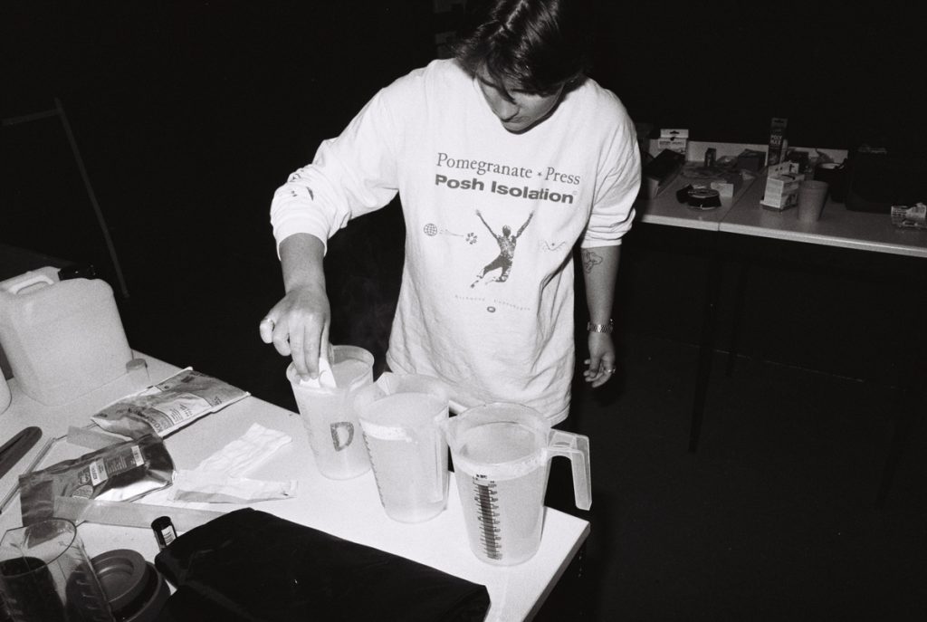 Mixing chemicals in the darkroom